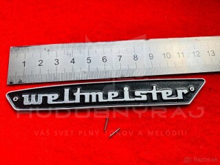 Logo Weltmeister na Akordeón+ 2 ks klinčeky- materiál- hliniková doštička