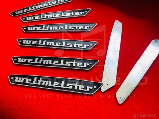 Logo Weltmeister na Akordeón+ 2 ks klinčeky- materiál- hliniková doštička