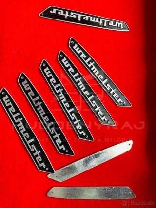 Logo Weltmeister na Akordeón+ 2 ks klinčeky- materiál- hliniková doštička